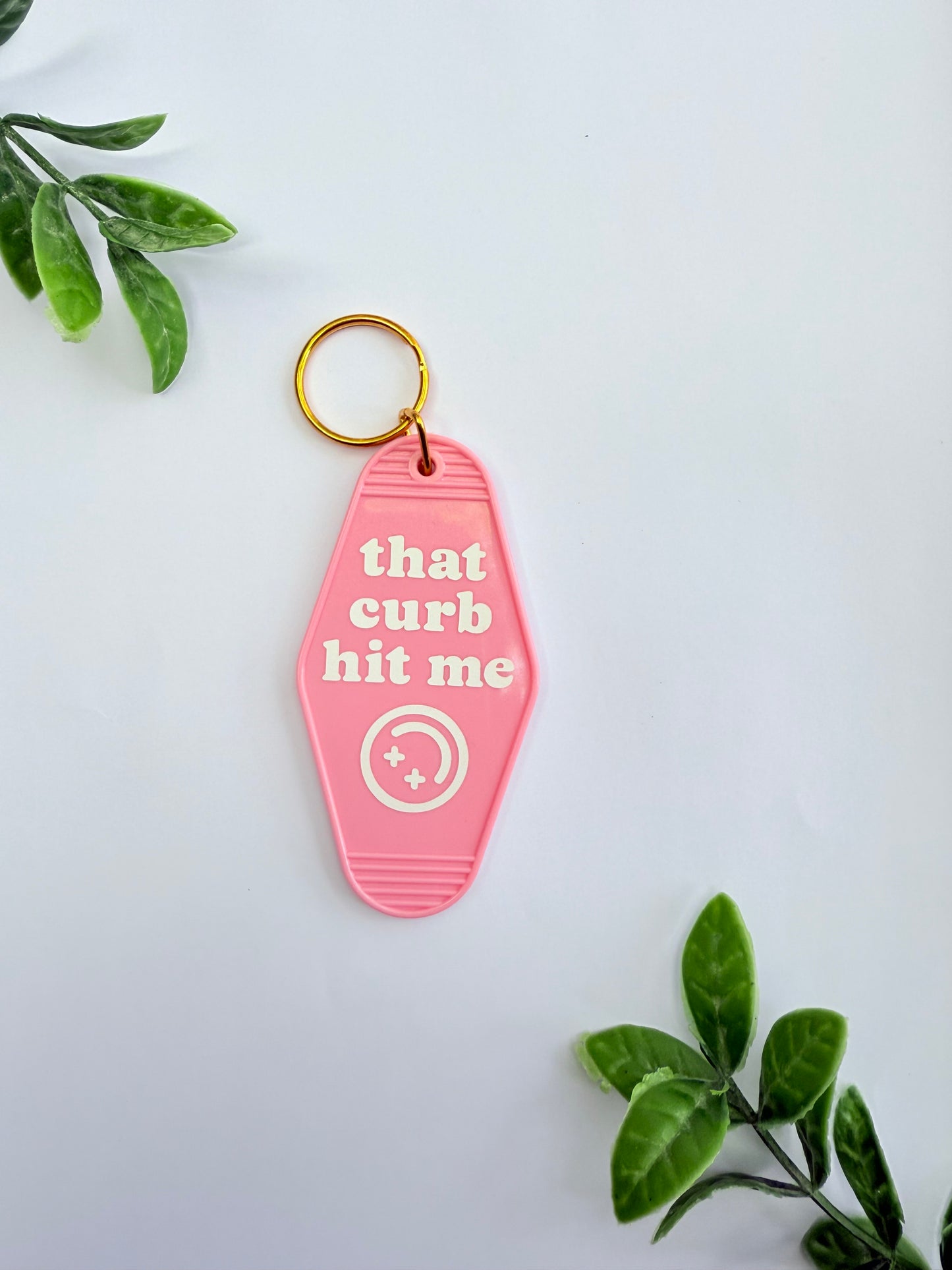 Motel Keychain - that curb hit me