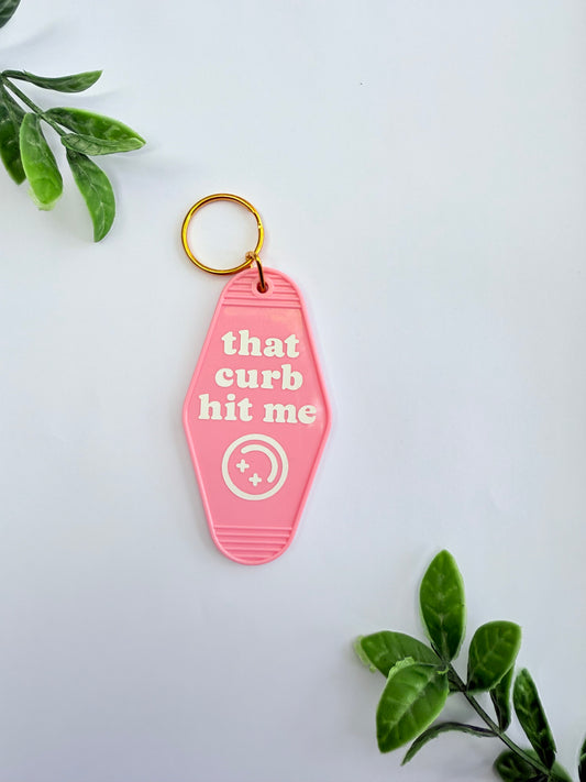 Motel Keychain - that curb hit me